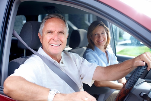 Older couple in a car