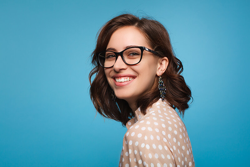 Woman With Glasses Smiling